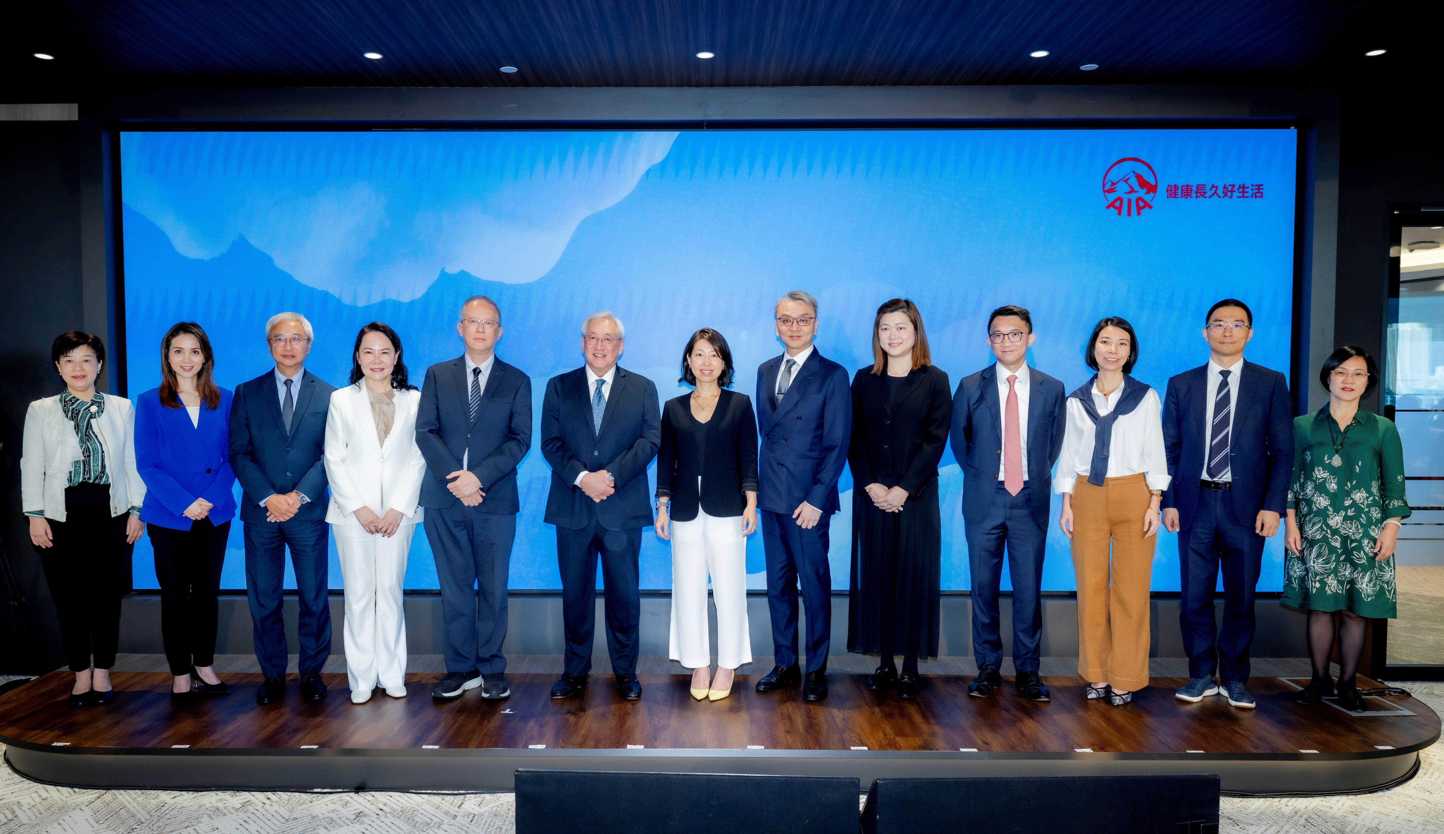 Ms Alice Liang, Chief Proposition & Healthcare Officer of AIA Hong Kong & Macau (centre), Dr York Chow, Head of Medical Office of AIA Hong Kong & Macau (sixth from left) and Dr Alexander Chiu, Head of Medical and Healthcare Provisions of AIA Hong Kong & Macau (sixth from right) with hospital representatives: Dr Yannie Soo of Union Hospital, Ms Grace Wong of Hong Kong Baptist Hospital, Mr Gilbert Lee of St. Paul’s Hospital, Mr Eric Wong of St. Teresa’s Hospital, Ms Qi Wei of Kiang Wu Hospital, Dr Jasperine Ho of The University of Hong Kong-Shenzhen Hospital, Mr Brian Siu of Shenzhen New Frontier United Family Hospital, Ms Lincole Lin of Guangzhou United Family Hospital, Ms Summer Suen of Zhongshan Chen Xinghai Hospital of Integrated Traditional Chinese and Western Medicine, and Mr Leo Shen of Shenzhen Heng Sheng Hospital, Guangzhou Xin Shi Hospital and Foshan Fosun Chancheng Hospital